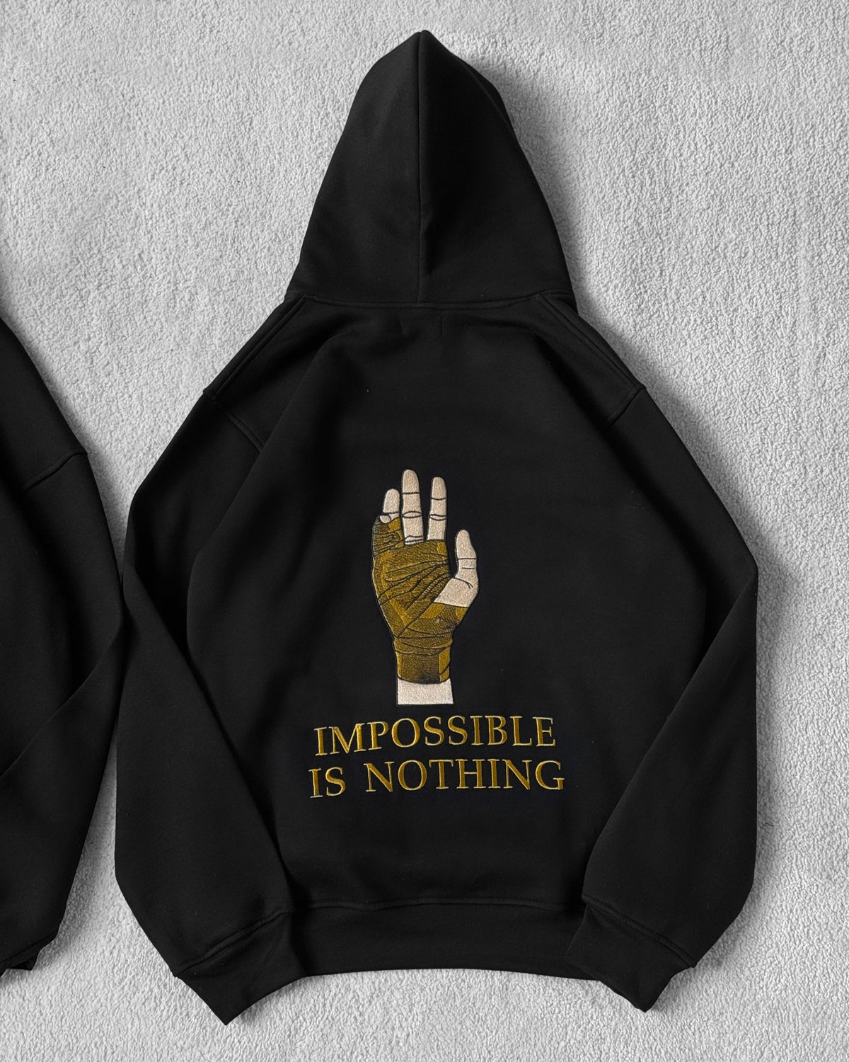 IMPOSSIBLE IS NOTHING HOODIE
