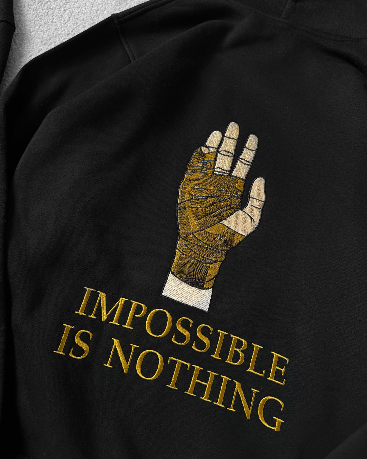 IMPOSSIBLE IS NOTHING HOODIE